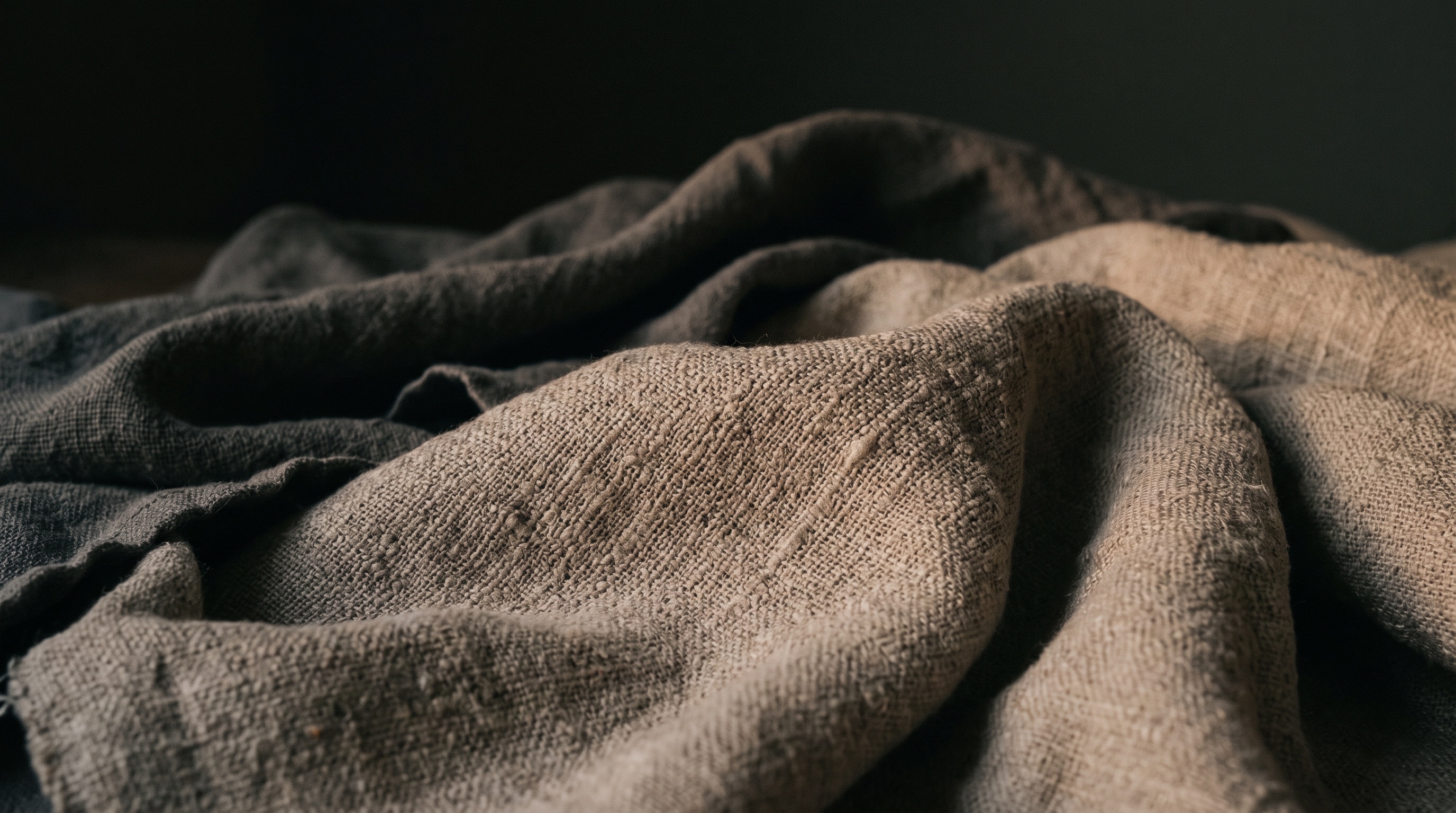 Heavy natural linen in raking dusk light.